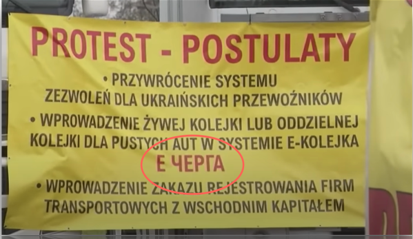 A yellow sign with black textDescription automatically generated
