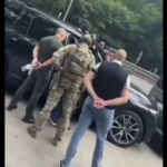 У Києві ДБР зупинило преміального класу авто з ексначальником Одеського ТЦК Борисовим
